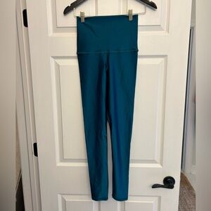 Emily Hsu Lacquer leggings for yoga, pilates, dance. Teal color, shiny finish.